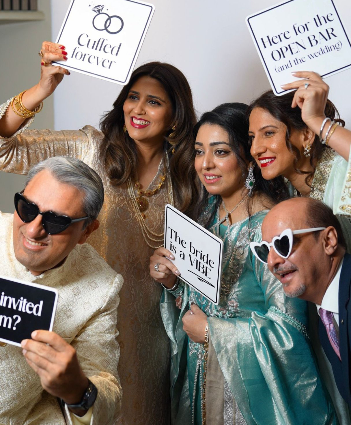 Wedding guests having fun at the Hikaya photobooth